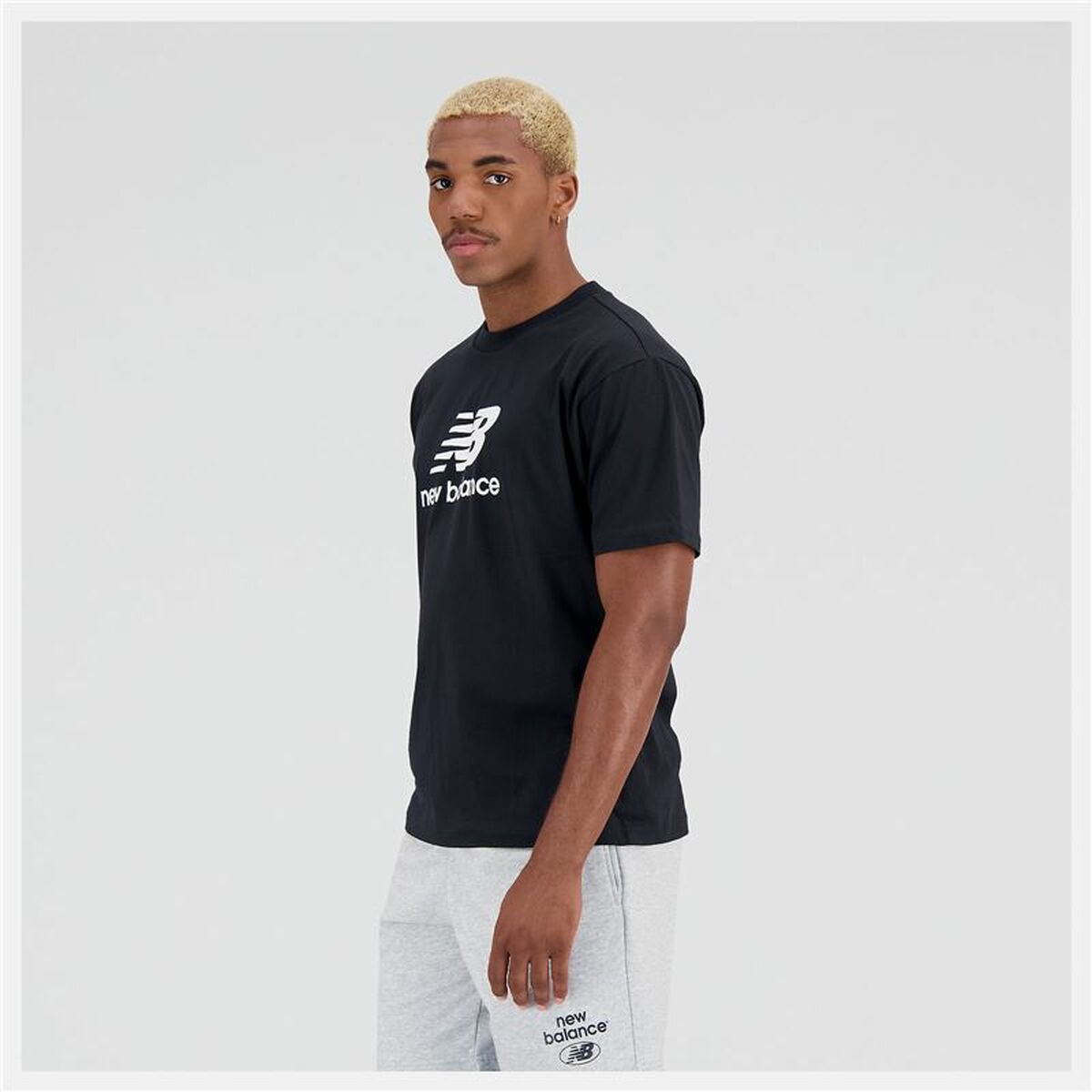 Heren-T-Shirt met Korte Mouwen New Balance Essentials Stacked Logo Zwart