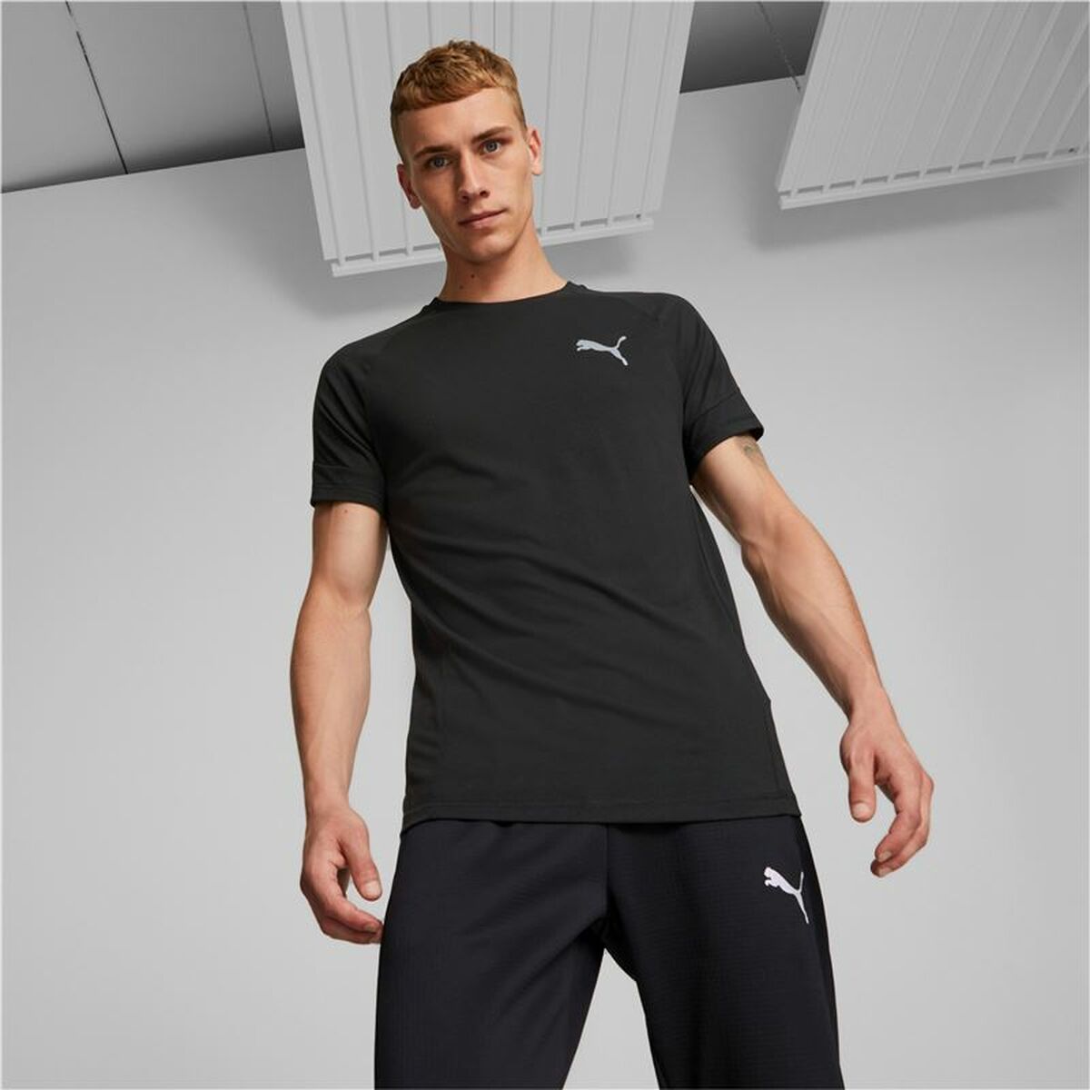 Heren-T-Shirt met Korte Mouwen Puma Evostripe Zwart Mannen