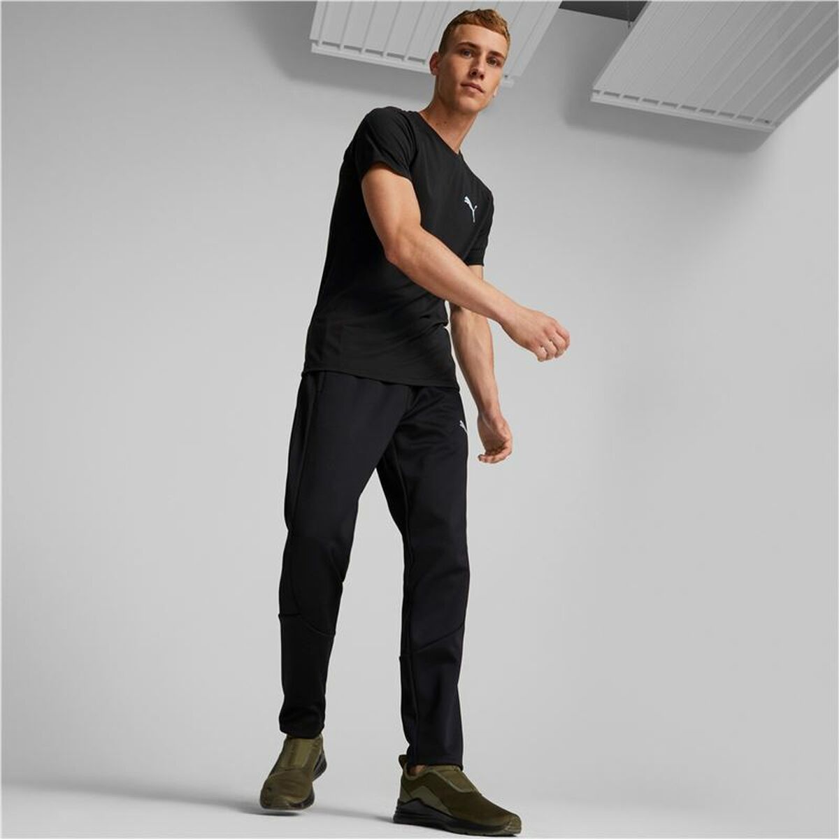 Heren-T-Shirt met Korte Mouwen Puma Evostripe Zwart Mannen