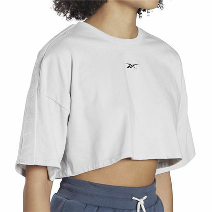Dames-T-Shirt met Korte Mouwen Reebok Fitness Crop Vector Velour Lichtgrijs