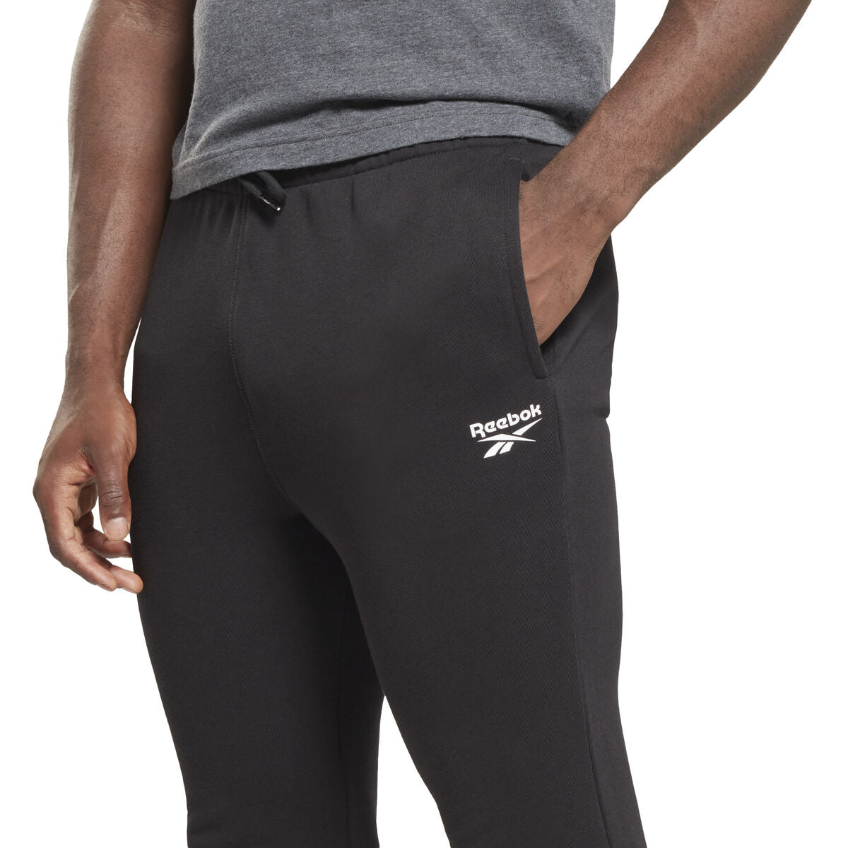 Broeken voor Volwassenen Reebok  LEFT LEG JOGG HS7376  Zwart Mannen